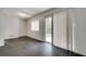 Bright dining room with sliding glass doors and dark gray flooring at 5815 Feldwood Rd, Atlanta, GA 30349