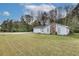 White single story home with a large backyard at 5815 Feldwood Rd, Atlanta, GA 30349