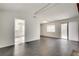 Open living room with view into the kitchen at 5815 Feldwood Rd, Atlanta, GA 30349