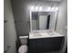 Double vanity bathroom with large mirror at 6354 Shannon Pkwy # 6C, Union City, GA 30291