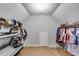 Large walk-in closet with custom storage solutions and organized hanging racks and shelves at 212 Teepee Trl, Whitesburg, GA 30185