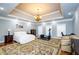 Large bedroom with a sitting area, and exercise equipment at 2120 Shaffer Rd, Cumming, GA 30041
