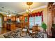 Spacious kitchen with an island, stainless steel appliances, and wood cabinets at 2120 Shaffer Rd, Cumming, GA 30041