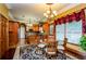 Kitchen features wood cabinets, granite countertops, and stainless steel appliances at 2120 Shaffer Rd, Cumming, GA 30041