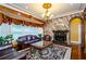 Living room features a fireplace, hardwood floors, and leather furniture at 2120 Shaffer Rd, Cumming, GA 30041