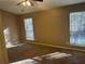 Bright bedroom with neutral walls, carpet, and two large windows at 2304 Hampton Dr, Decatur, GA 30035