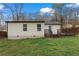 Spacious backyard featuring wooden deck, partial fence and grass at 2409 Swallow Se Cir, Atlanta, GA 30315