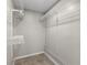 Spacious walk-in closet with white wire shelving for optimal storage at 2409 Swallow Se Cir, Atlanta, GA 30315
