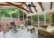 Screened porch with brick accents and an open-air feel, perfect for outdoor relaxation at 6550 Bridgewood Valley Rd, Atlanta, GA 30328