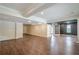 Finished basement with a neutral wall color scheme, wood floors and flexible layout for customization at 1901 Shelburne Cv, Marietta, GA 30068