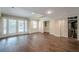 Finished basement with wood floors, neutral walls, and walkout doors, perfect for entertaining at 1901 Shelburne Cv, Marietta, GA 30068