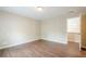 Bedroom showcasing hard wood floors and a doorway to a closet space at 1901 Shelburne Cv, Marietta, GA 30068