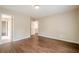 Bedroom featuring wood flooring with a doorway leading to another room at 1901 Shelburne Cv, Marietta, GA 30068