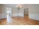 Traditional dining room with hardwood floors and paneled walls at 1901 Shelburne Cv, Marietta, GA 30068