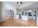 Open-concept kitchen showcases modern appliances, granite countertops and access to other rooms at 1901 Shelburne Cv, Marietta, GA 30068