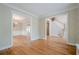 Spacious living room with hardwood floors and staircase at 1901 Shelburne Cv, Marietta, GA 30068