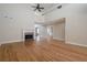 Open living area with a marble fireplace, hardwood floors and bright interior, perfect for entertaining at 1901 Shelburne Cv, Marietta, GA 30068