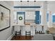 Kitchen with breakfast bar and white shaker cabinets at 2012 Mendenhall Cir, Atlanta, GA 30341