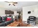 Open living space with modern kitchen, comfortable seating, and ample natural light at 366 Cherryhill Ln, Woodstock, GA 30188