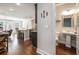 Spacious open concept layout with a kitchen island, living area, and half bathroom at 366 Cherryhill Ln, Woodstock, GA 30188
