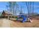 Charming community playground and gazebo surrounded by mature trees at 366 Cherryhill Ln, Woodstock, GA 30188