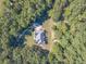 House nestled in a large wooded lot, offering privacy at 946 Gaithers Rd, Mansfield, GA 30055