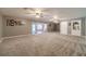 Large finished basement with multiple ceiling fans at 946 Gaithers Rd, Mansfield, GA 30055