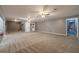 Finished basement with large carpeted area at 946 Gaithers Rd, Mansfield, GA 30055