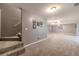 Spacious finished basement with neutral carpeting at 946 Gaithers Rd, Mansfield, GA 30055