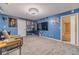 Finished basement recreation room, featuring a large TV and ample space at 946 Gaithers Rd, Mansfield, GA 30055