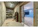 Basement storage area with shelving units for various items at 946 Gaithers Rd, Mansfield, GA 30055
