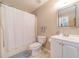 Clean and bright bathroom with white vanity and shower/tub at 946 Gaithers Rd, Mansfield, GA 30055