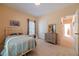 Bright bedroom with double closet and carpeting at 946 Gaithers Rd, Mansfield, GA 30055