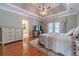 Spacious main bedroom with hardwood floors and private access to bathroom at 946 Gaithers Rd, Mansfield, GA 30055