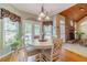 Charming breakfast nook with round table and chairs near kitchen and Gathering room at 946 Gaithers Rd, Mansfield, GA 30055