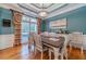 Farmhouse-style dining room with hardwood floors at 946 Gaithers Rd, Mansfield, GA 30055
