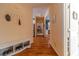 Welcoming entryway with hardwood floors and coat hooks at 946 Gaithers Rd, Mansfield, GA 30055