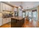 Large kitchen with granite island, stainless steel appliances, and breakfast nook at 946 Gaithers Rd, Mansfield, GA 30055