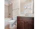 Functional bathroom with a tub, vanity, and toilet for a modern feel at 231 Haney Rd, Woodstock, GA 30188