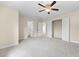 Bright bedroom with a ceiling fan, closet, and access to another room at 231 Haney Rd, Woodstock, GA 30188