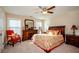 Spacious Primary bedroom with a king-size bed and plenty of natural light at 231 Haney Rd, Woodstock, GA 30188