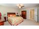 Large bedroom with a king-size bed and access to a bonus room at 231 Haney Rd, Woodstock, GA 30188