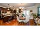 Kitchen features dark cabinetry, an island, and breakfast nook at 231 Haney Rd, Woodstock, GA 30188