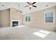 Large living room with carpet, high ceilings, a fireplace, and many windows at 231 Haney Rd, Woodstock, GA 30188