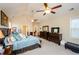 Main bedroom with high ceilings, ceiling fans, and plenty of space for furniture at 231 Haney Rd, Woodstock, GA 30188