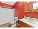 Simple bathroom with a shower/tub combo and wood vanity at 337 N Clayton St, Lawrenceville, GA 30046