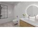 Modern bathroom with white tile and a floating vanity at 337 N Clayton St, Lawrenceville, GA 30046