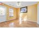 Empty room with hardwood floors and a door leading outside at 337 N Clayton St, Lawrenceville, GA 30046