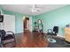 Spacious hair salon room featuring a large mirror, styling chairs, and hardwood floors at 337 N Clayton St, Lawrenceville, GA 30046