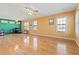 Large living area with hardwood floors and fresh paint at 337 N Clayton St, Lawrenceville, GA 30046